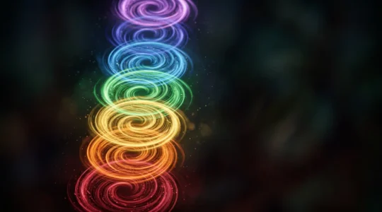 Représentation abstraite et métaphorique des centres énergétiques en rotation illustrant la vitalité et le flux d'énergie vitale